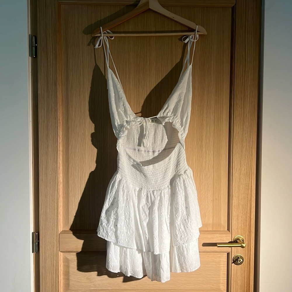 Nikki’s Beach House White Cutout Dress.